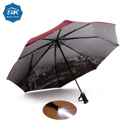 Portable raindrops automatic LED folding travel umbrella with a light torch